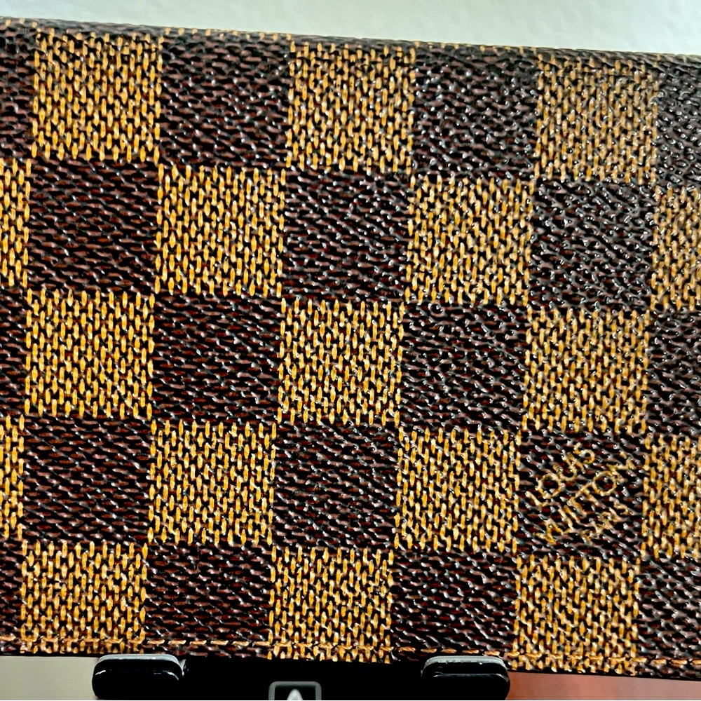 Louis Vuitton Damien Men’s Leather, Coated Fabric wallet